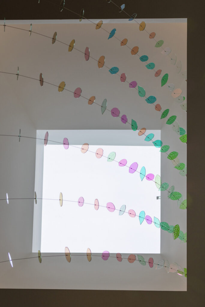 2,000 dichroic glass petals and leaves suspended in the atrium