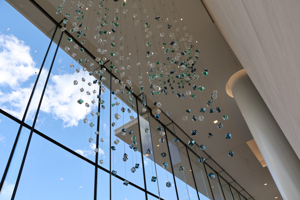 View of the suspended sculpture from the interior, mid day