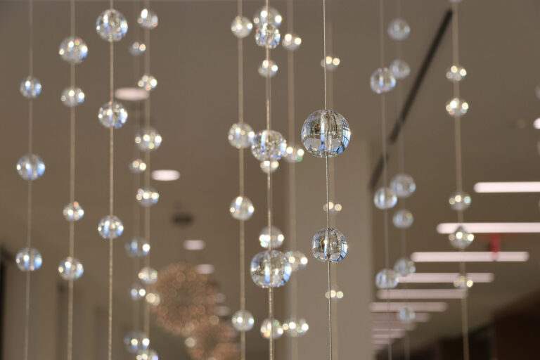 Waterfall: Ice to Clarity, suspended glass installation by Kana Tanaka at Enloe Health Gonzales Comprehensive Cancer Center in Chico, California