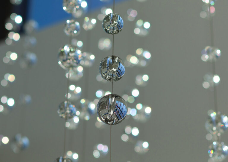 Waterfall: Ice to Clarity, suspended glass installation by Kana Tanaka at Enloe Health Gonzales Comprehensive Cancer Center in Chico, California